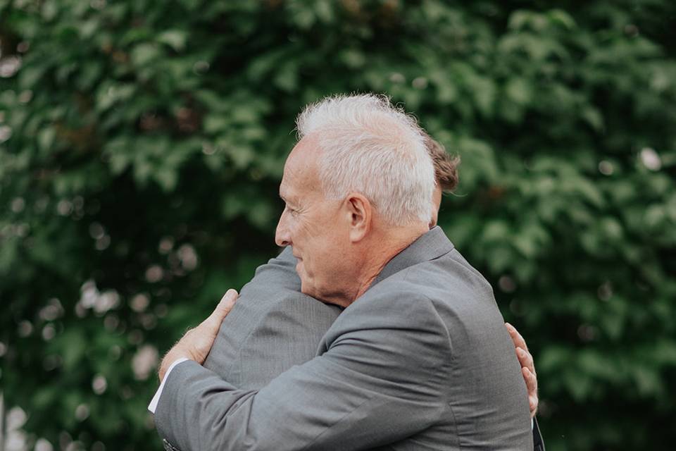 Father and Groom Hug
