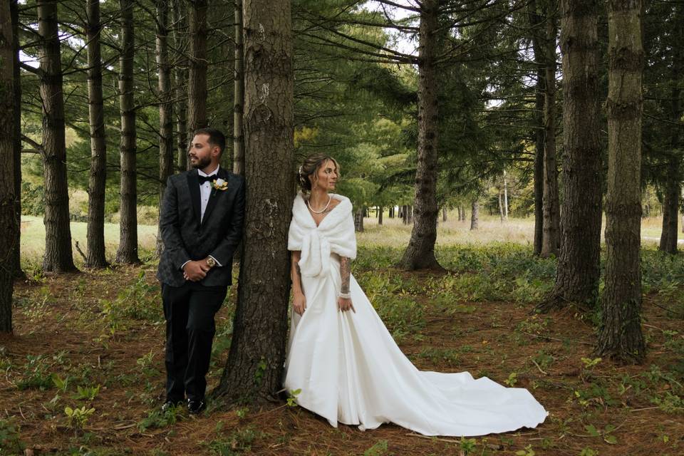 Couple in woods on property