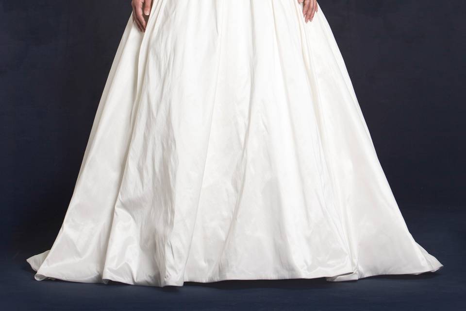 Lis Simon Style:  GEMMA
Illusion jewel neckline, lace applique bodice, shimmer taffeta ball gown skirt with pockets.