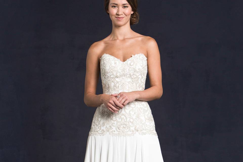 Lis Simon Style:  GEORGIA
Strapless sweetheart neckline, beaded & embroidered elongated bodice,  chiffon A-line skirt, zipper back.