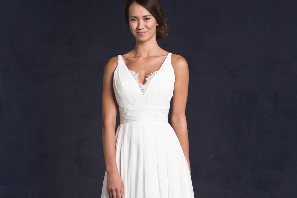 Lis Simon Style:  GILLIAN
Chiffon v-neck gown with pleated bodice with lace appliqués, A-line skirt with gathers.