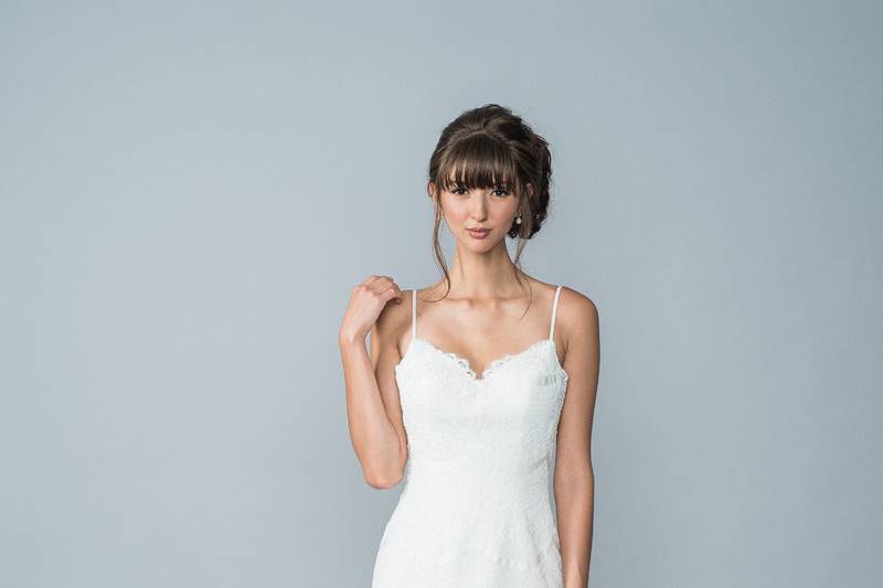 Style Halifax <br> This A-line gown features a modified sweetheart neckline and dropped waist adding to the romantic style. 