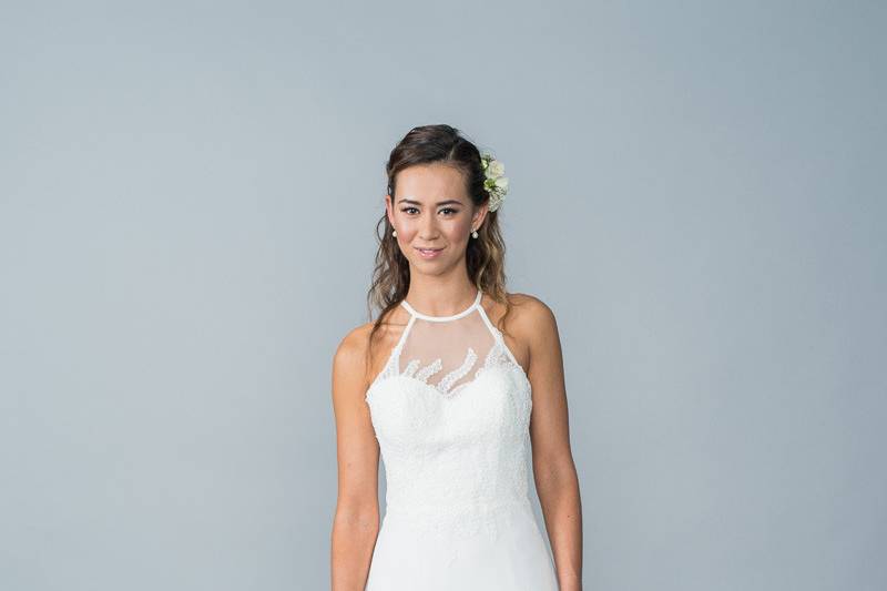 Style Harlem <br> Delicate lace appliqué detail on bodice with halter illusion sweetheart neckline.