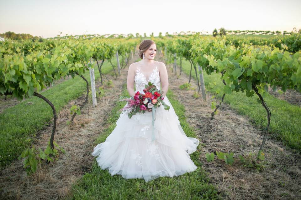 Sitting on a swing in lace gown