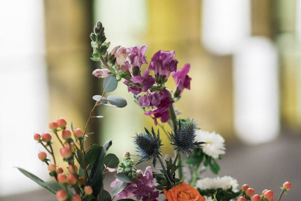 Flowers in tiny rose gold vases