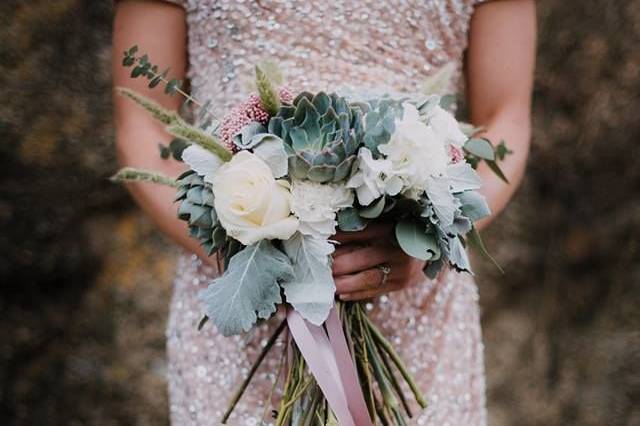 Holding a bouquet | Photo by Lavel Marie Photograhy
