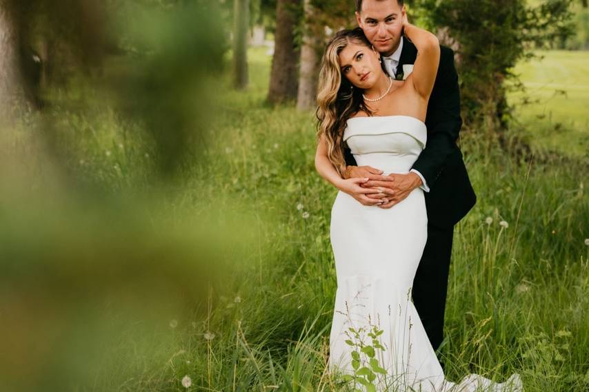 Bride and Groom in the Pasture