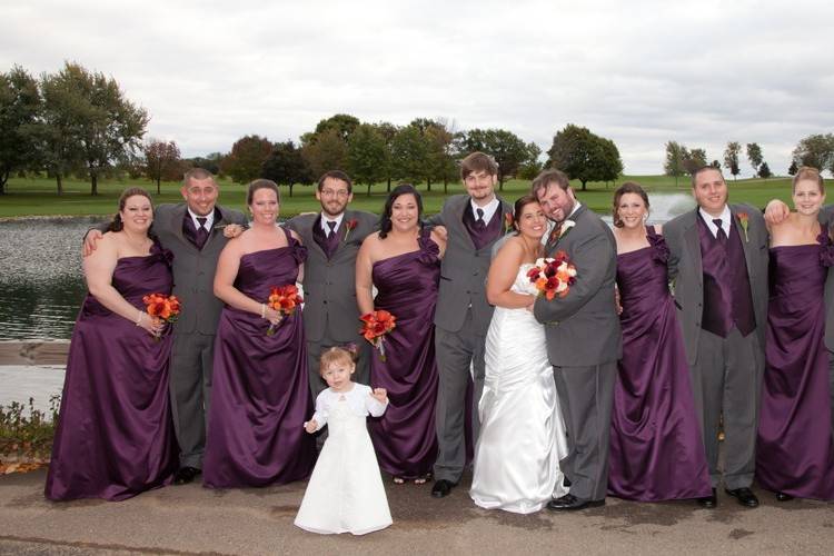 The couple with the bridesmaids and groomsmen