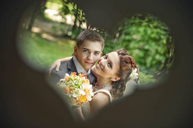Amazing couple in the garden. Orange wedding