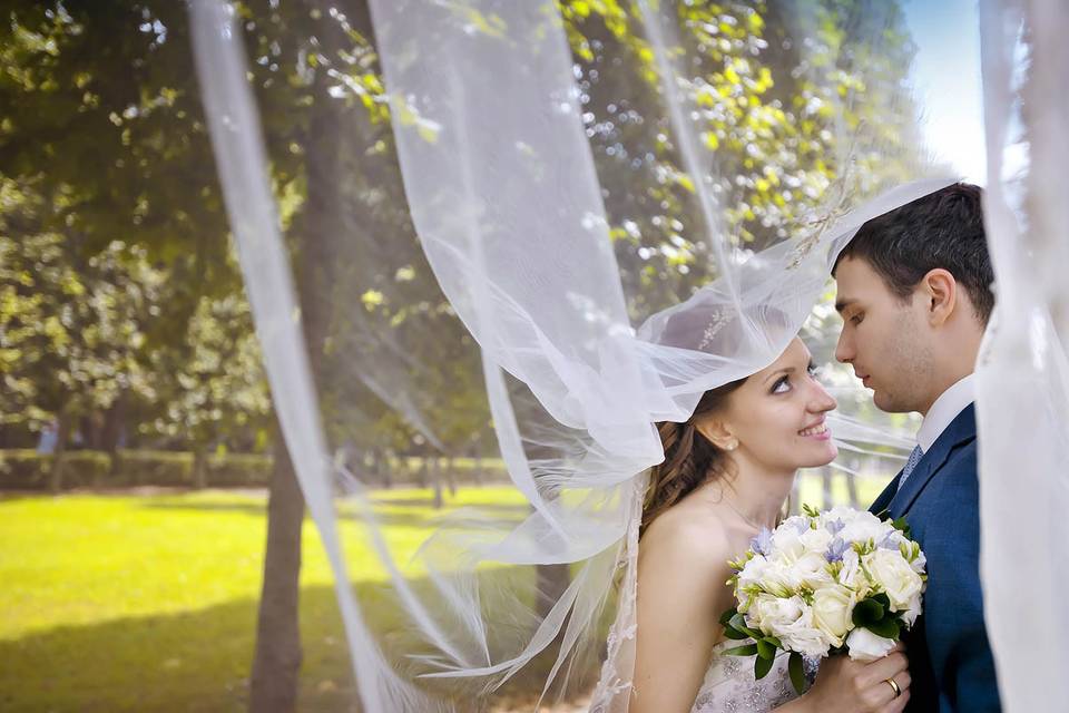 It looks great long veil with couple