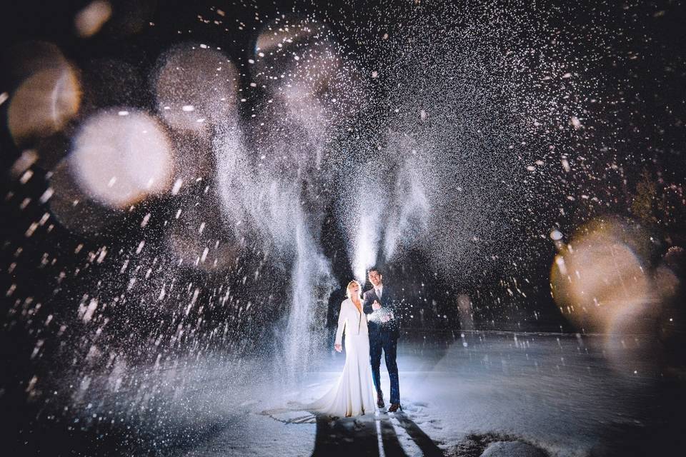 Spray champagne at the camera