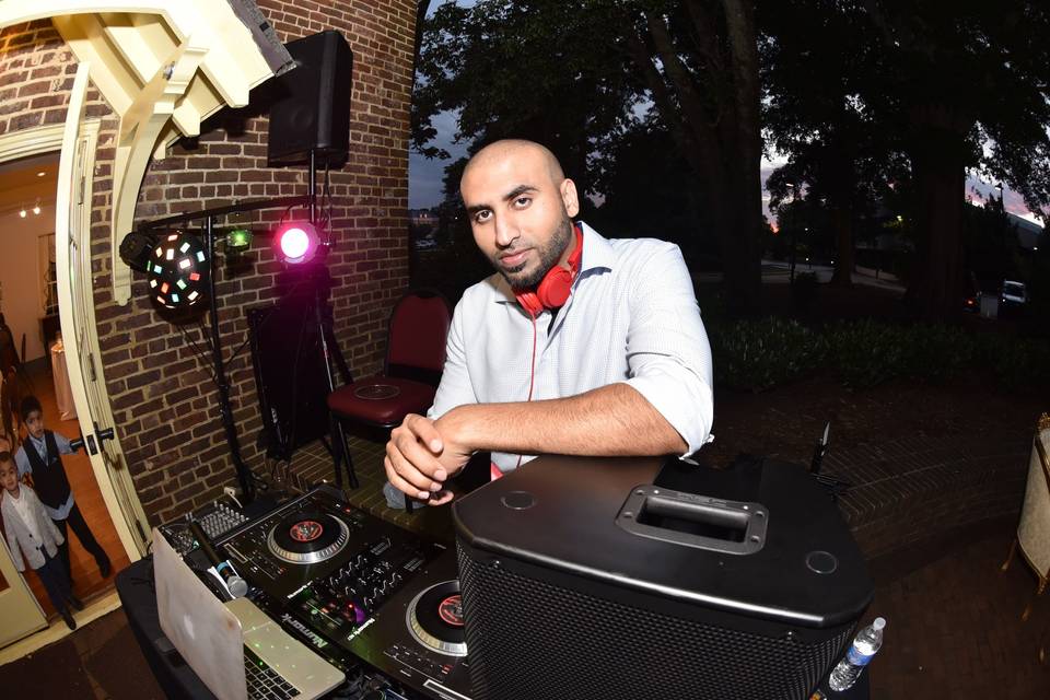 DJ Kash at an outdoor celebration