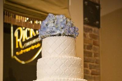 Wedding cake with blue flowers