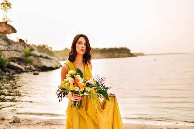 By the beach in a yellow dress