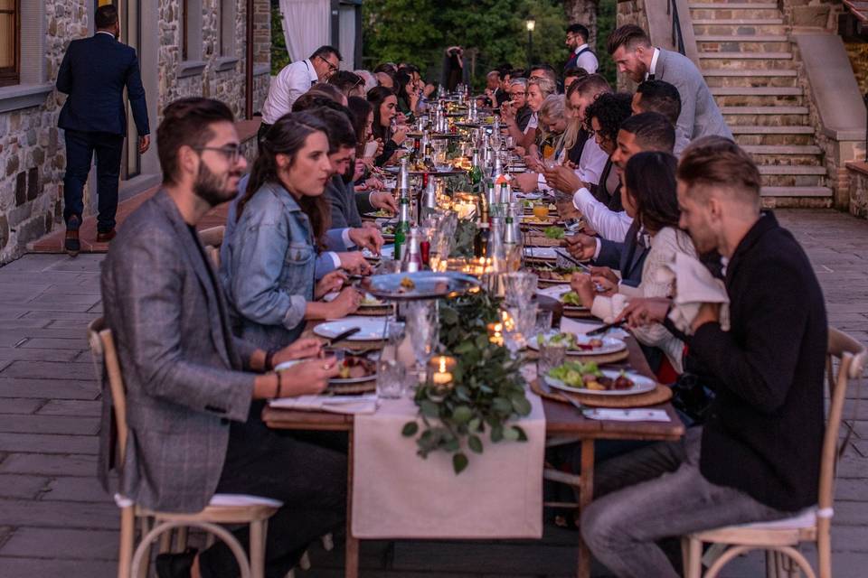 Long dinner table at sunset