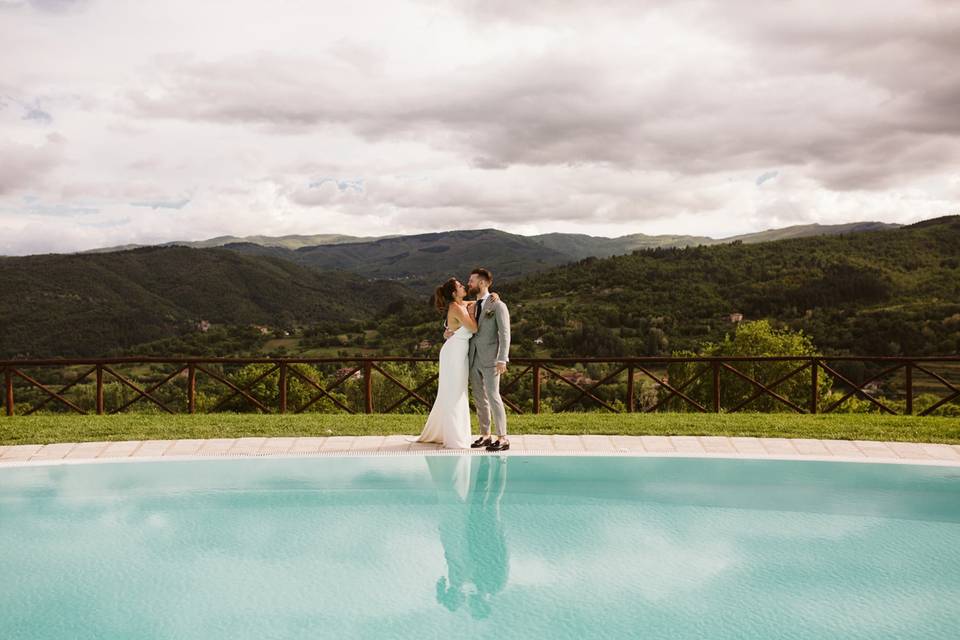 Bride and groom at the pool