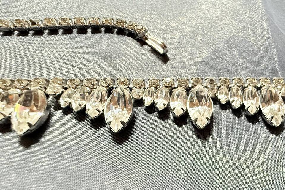 Antique jeweled necklline