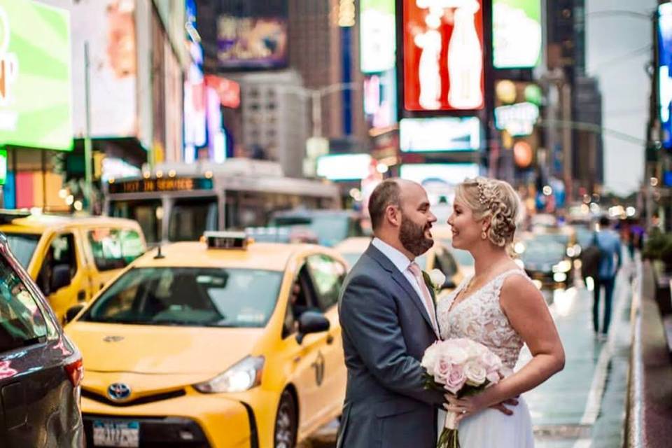 Couple embracing near traffic