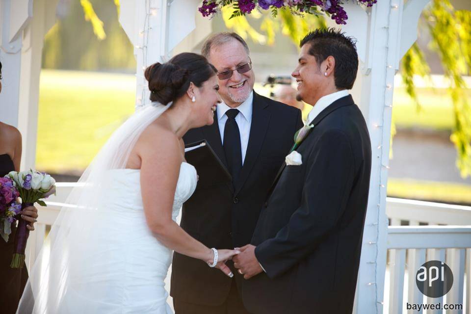 Steve officiating an outdoor wedding