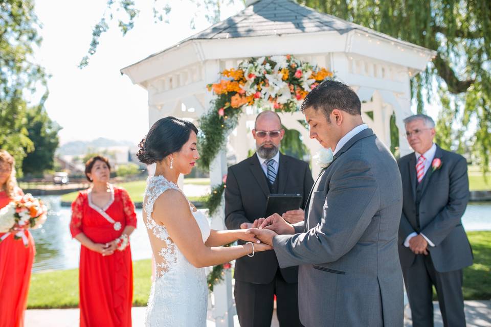 Couple exchanging rings