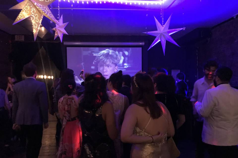 Party using the projector