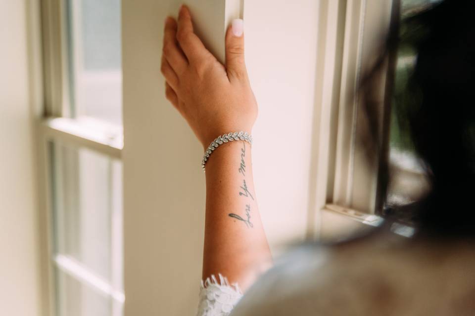 A shot of the bride's tattoo (Boone wedding)