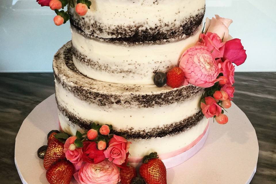 Naked wedding cake with berries