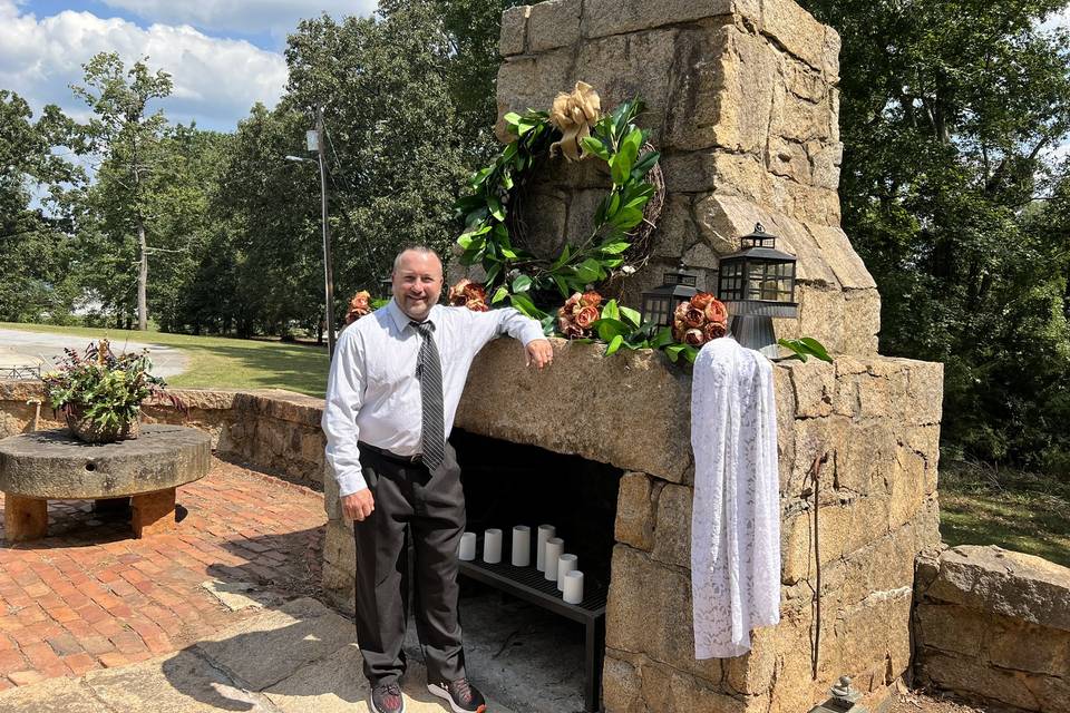 Groom at Fireplace