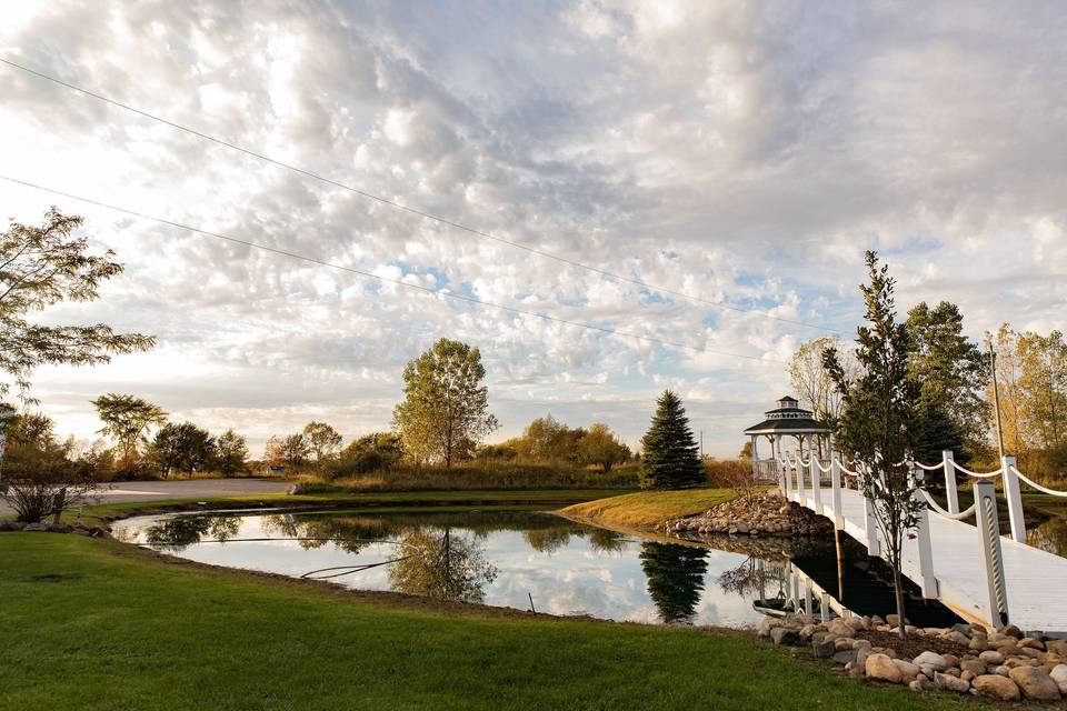 Pond with White Bridge