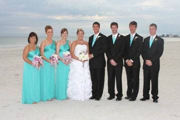The couple with the bridesmaids and groomsmen
