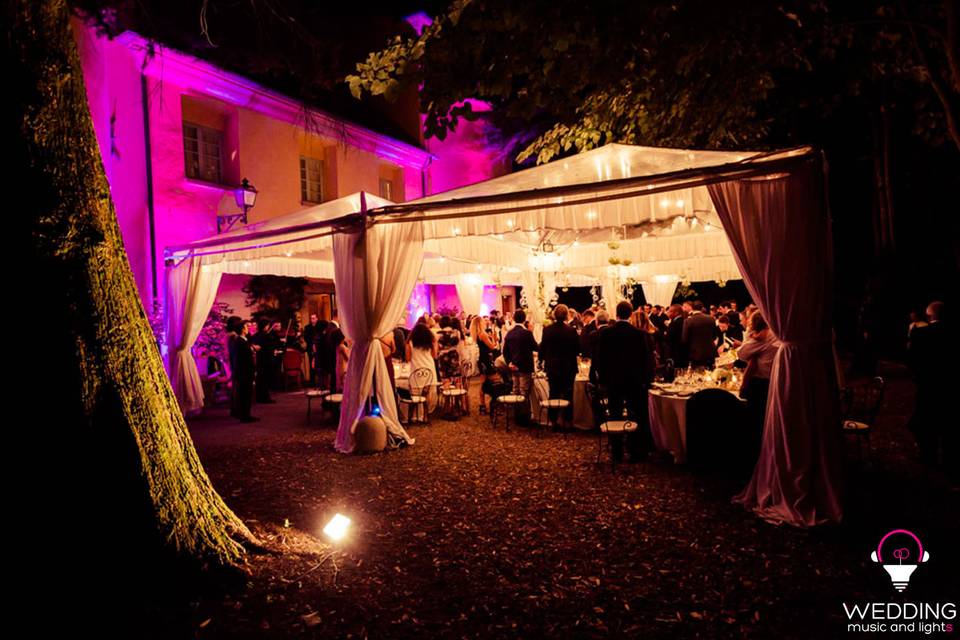 Wedding architectural lighting string lights Badia Campoleone - Tuscany - Italy