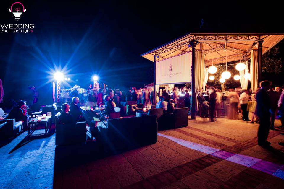 Wedding party DJ architectural lighting Badia Campoleone - Tuscany - Italy