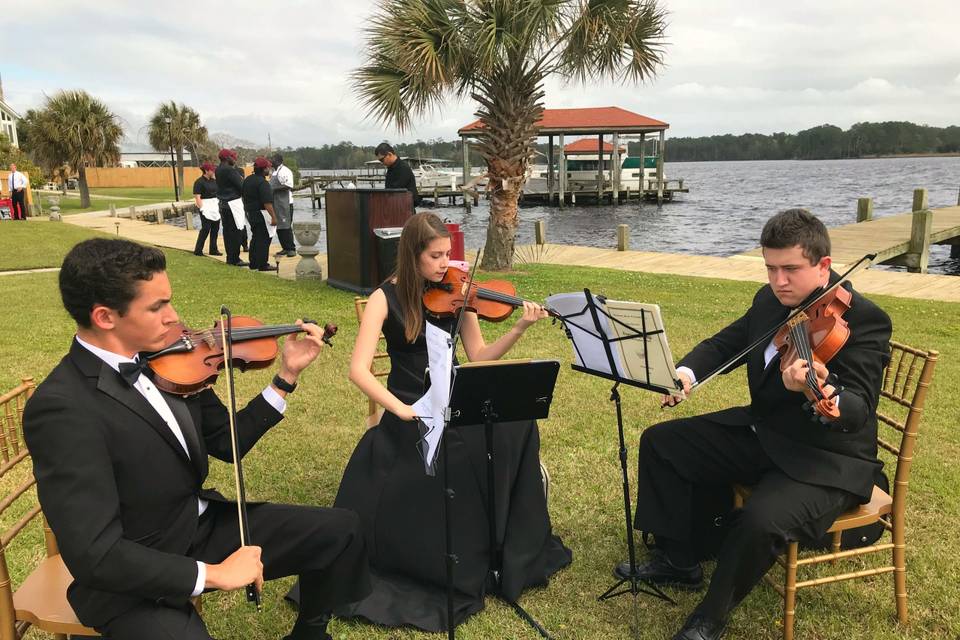 The high strung trio played the processional beautifully.