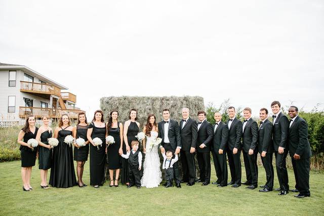 The couple with the bridesmaids and groomsmen