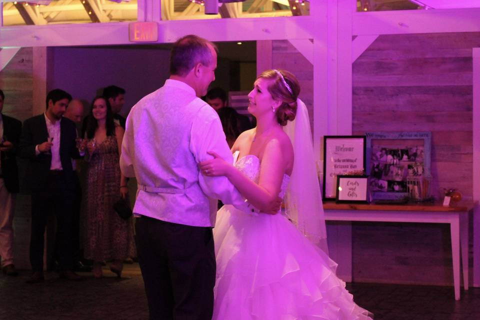 An emotional father and daughter dance