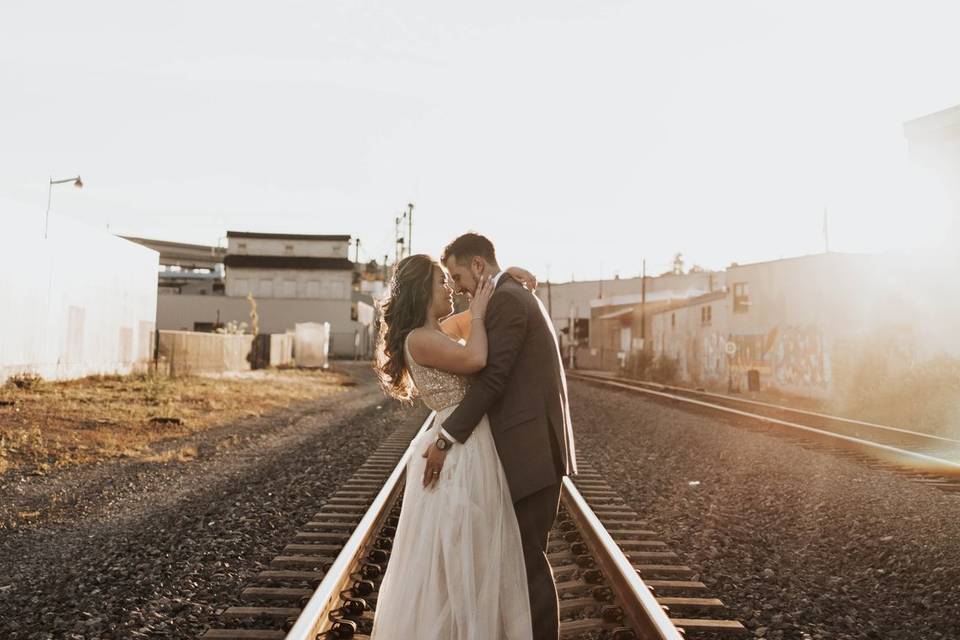 Wedding couple on train tracks