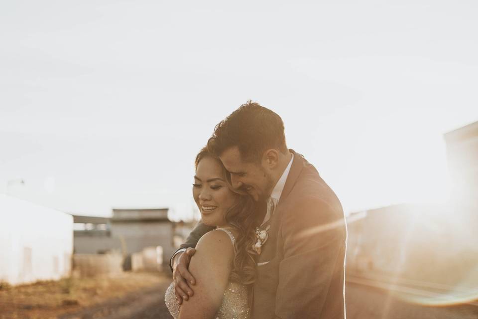 Wedding couple on train tracks