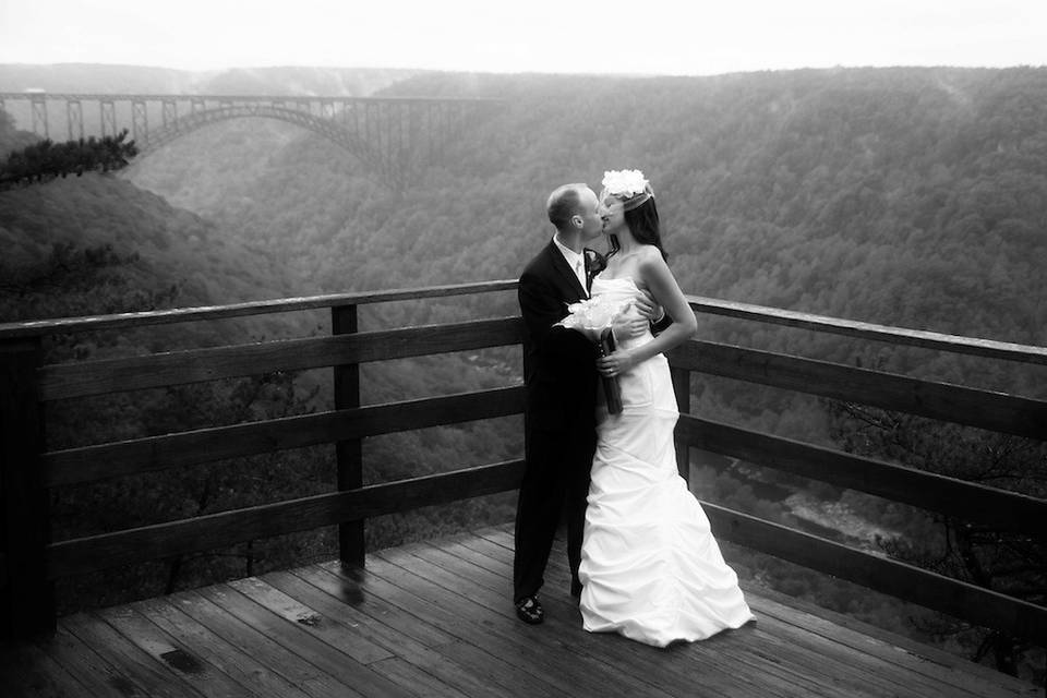 Couple kiss by the ledge