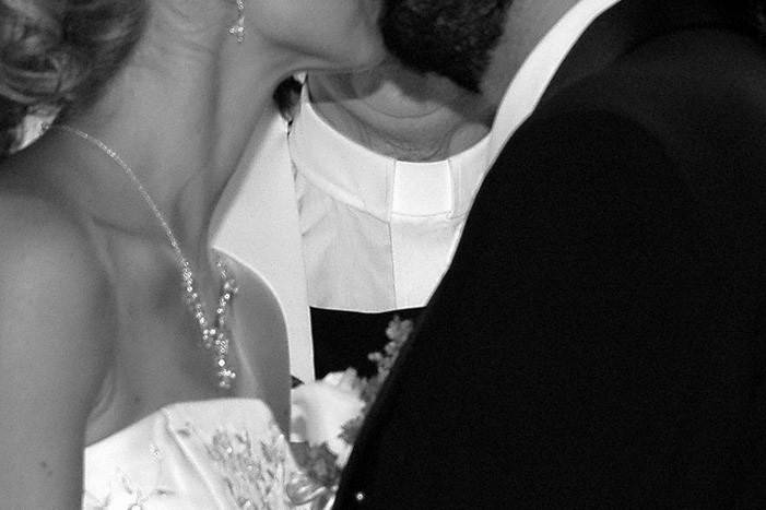 Newlyweds kissing