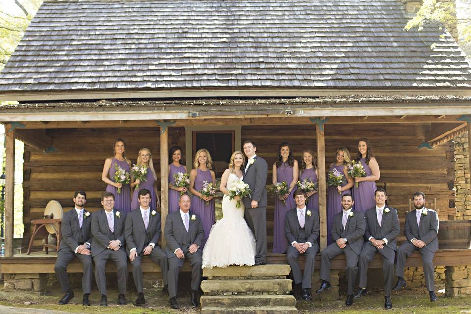 The couple with the bridesmaids and groomsmen