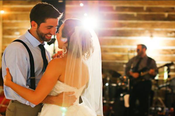 Newlyweds dancing to the band's music