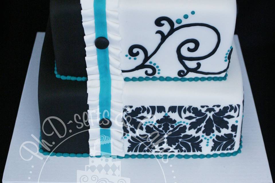 Elegant bridal shower cake with Damask stenciling and hand-piped details.
