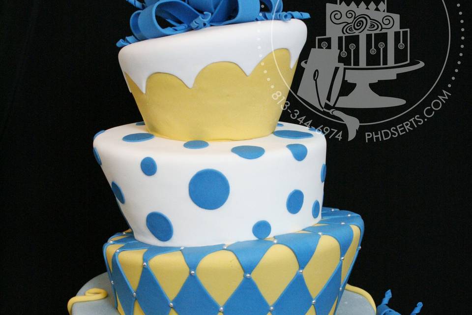 Topsy turvy cake with polka dots, retro dots, swirls, bows, and diamonds!  What more could you ask for?!