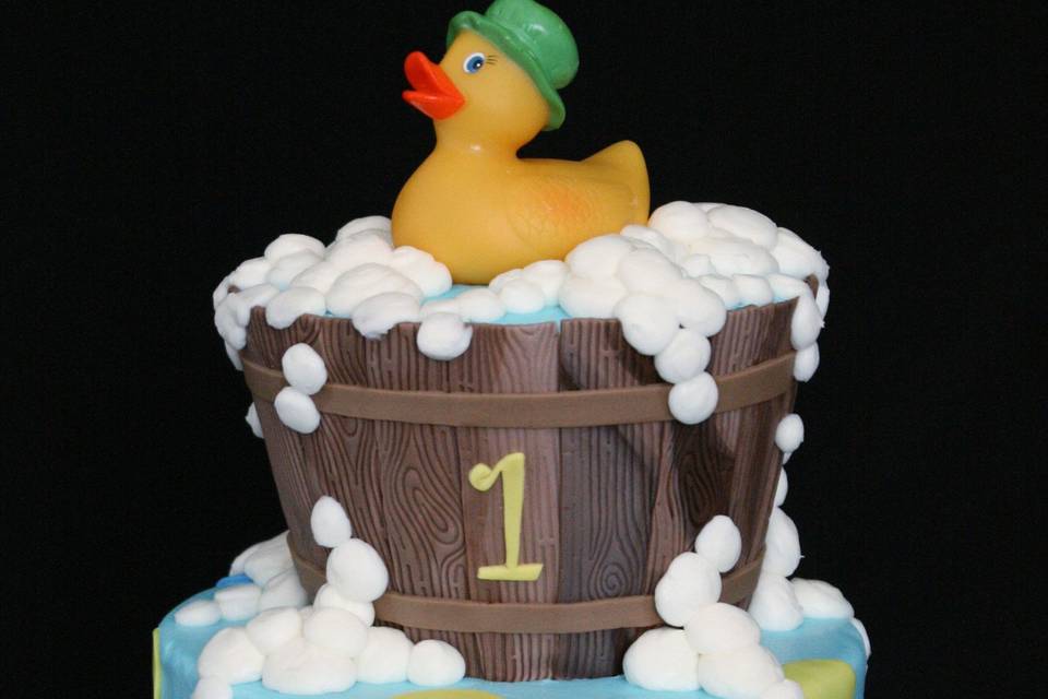Rubber ducky-themed 1st birthday cake