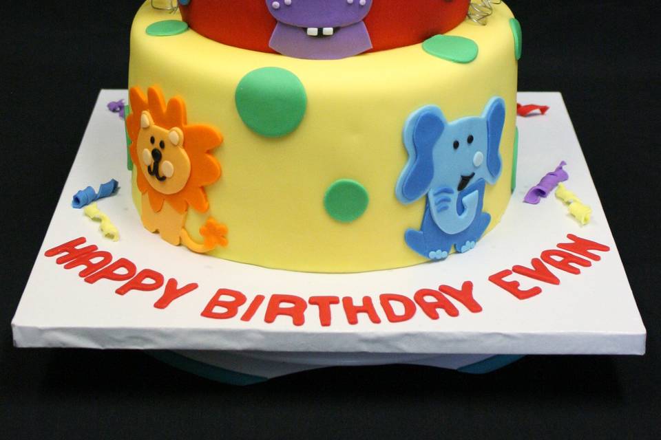 Baby animal safari birthday cake