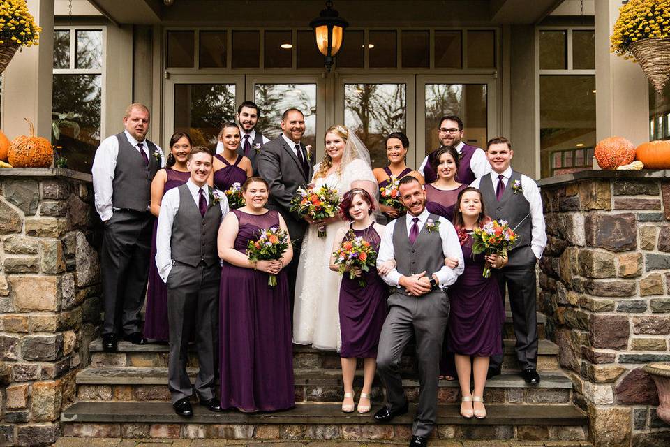 The couple with bridesmaid and groomsmen