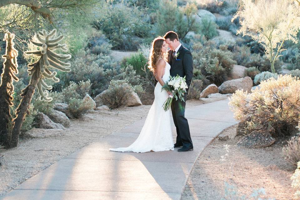 Couple pose on a path