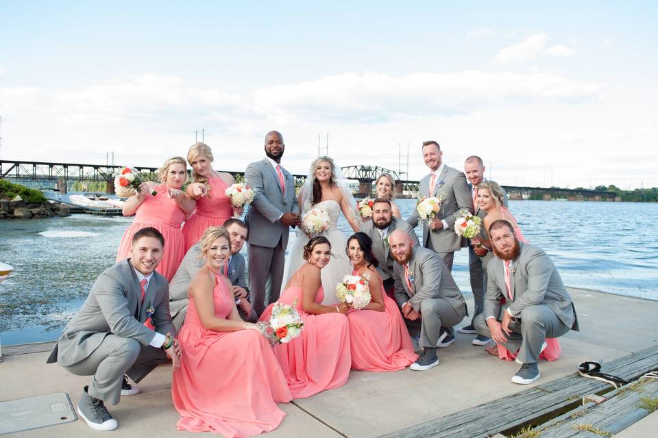 The couple with the bridesmaids and groomsmen