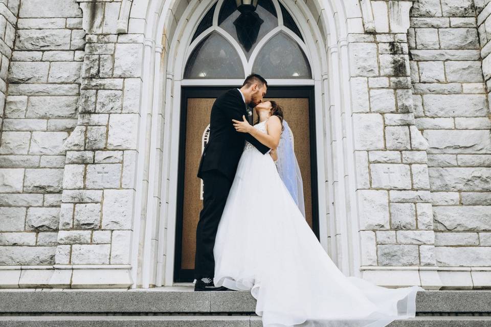 Kiss in front of church