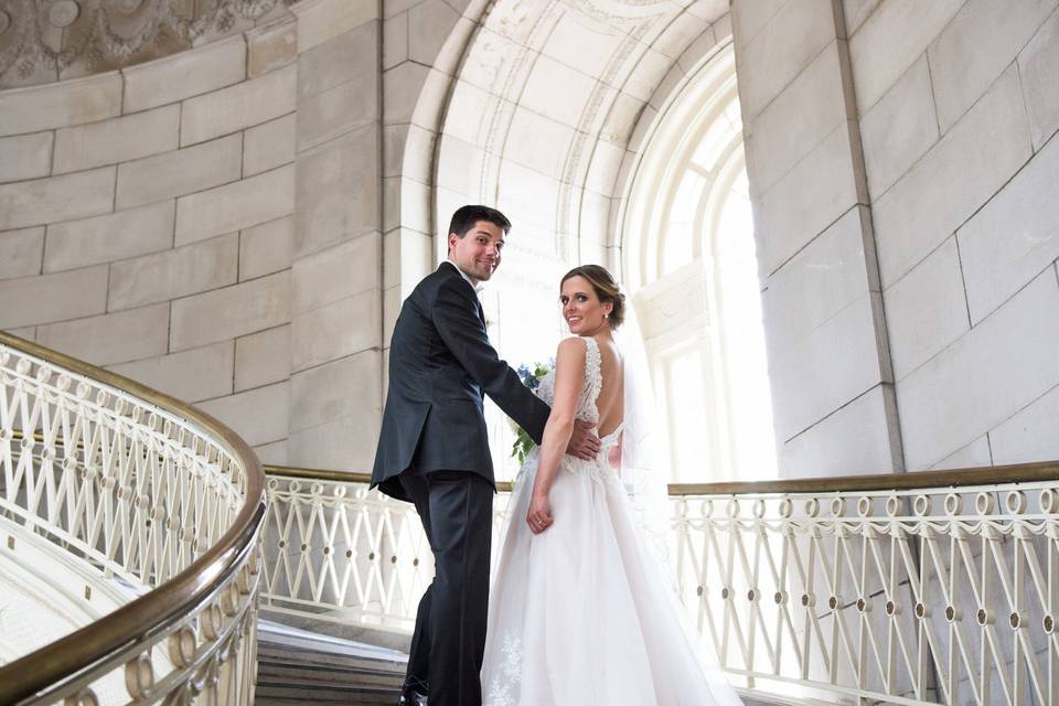 Couple on grand staircase